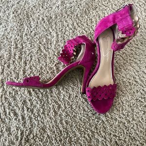 Woman’s pink heeled sandals